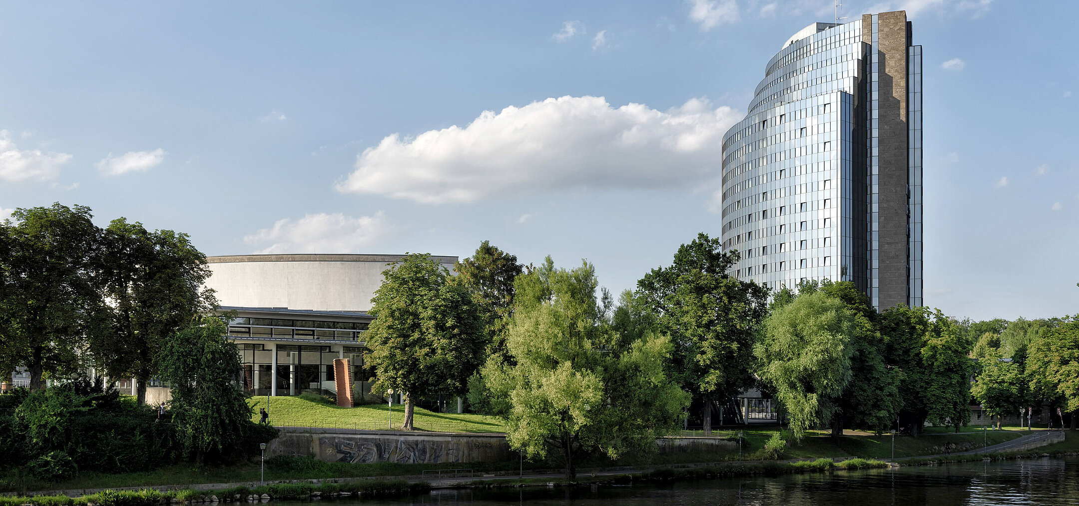 Maritim Hotel Ulm by the Danube, surrounded by greenery and modern architecture