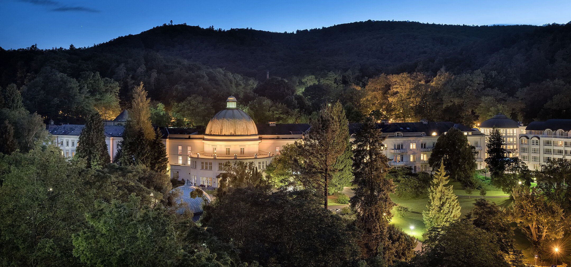 Maritim Hotel Bad Wildungen at night, beautifully lit and surrounded by nature